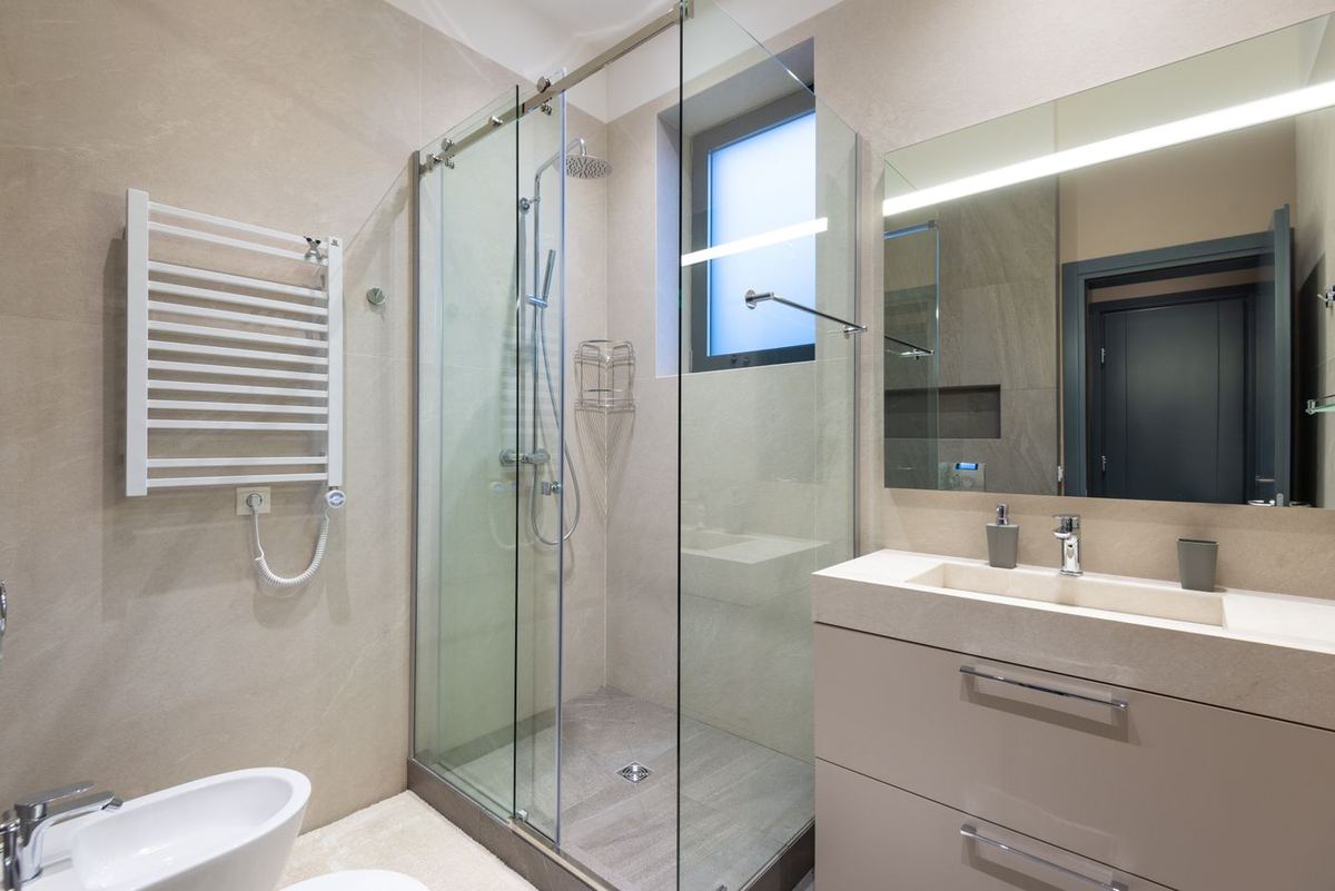 Clean bathroom with glass shower and no water spots