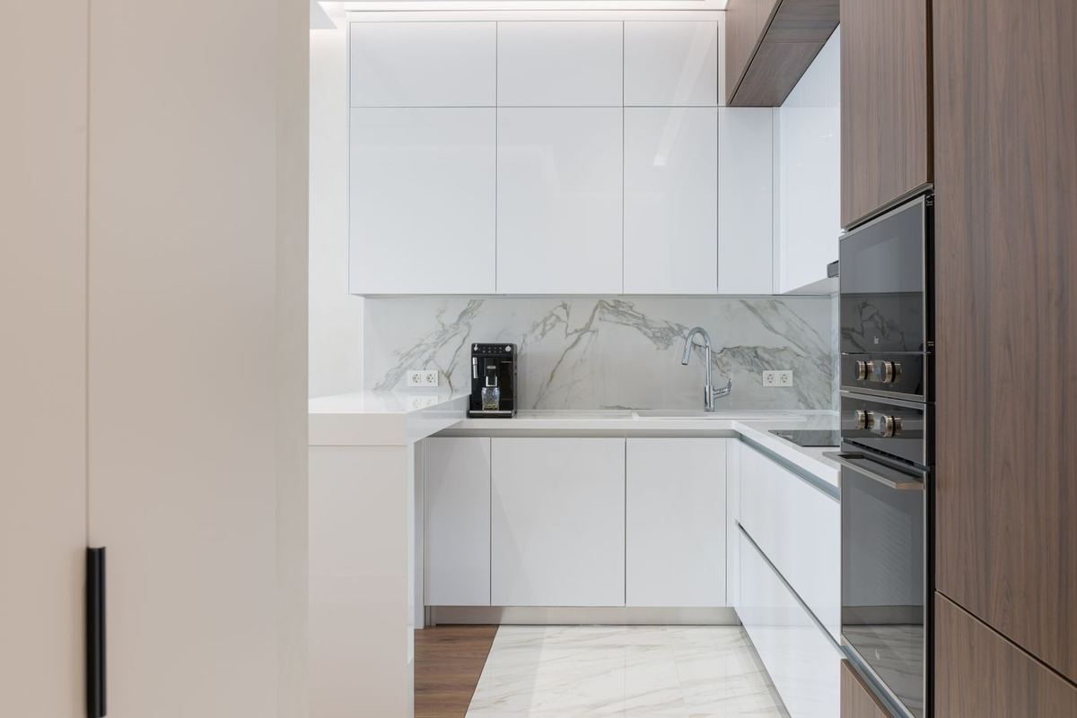 Empty modern kitchen cleaned inside every cabinet